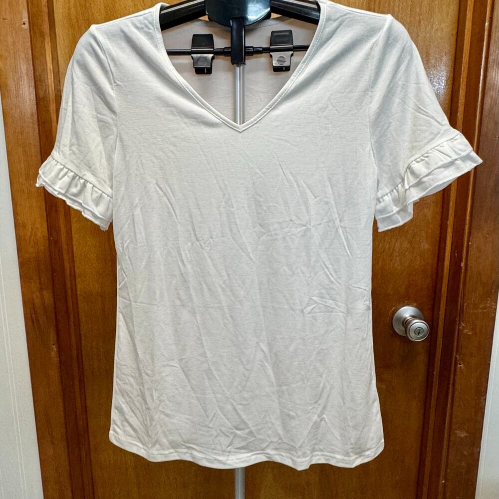 Women's Shirt, NWOT. White with ruffles on the sleeves.
